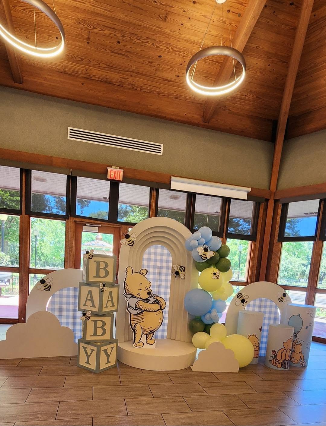 Winnie the Pooh themed baby shower with arches, BABY blocks and balloon garland